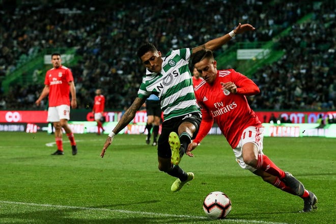 Benfica beats Sporting to move closer to Porto in Portugal