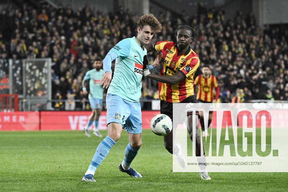 240308 KV Mechelen vs KVC Westerlo Nicolas Madsen of Westerlo battles for  the ball with NgalAyel